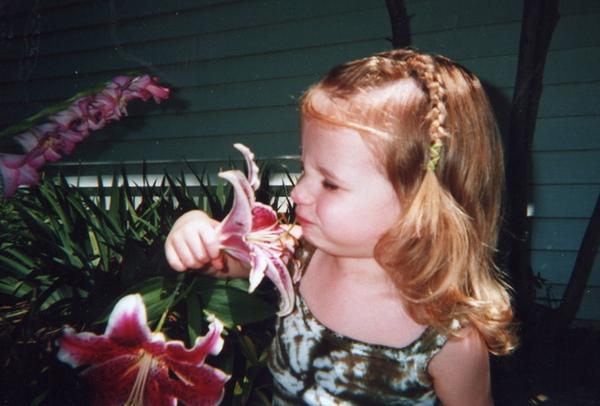 My 2 year old little peach Chloe Violet smelling the Lillies:)