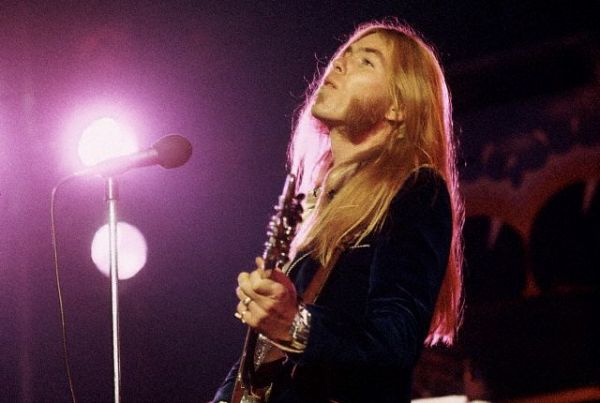 Gregg Allman with guitar in hand. Any idea when or where this was taken?